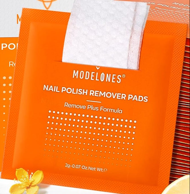 Two packages of 'Modelones' nail polish remover pads on a white background